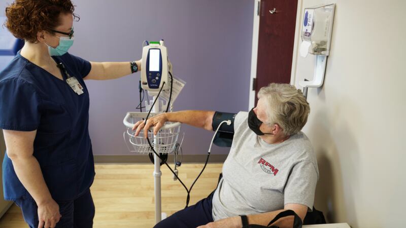 Nurse practitioner Jennifer Stiller enrolls Susan Wagner in a new Duke study in Kannapolis for...