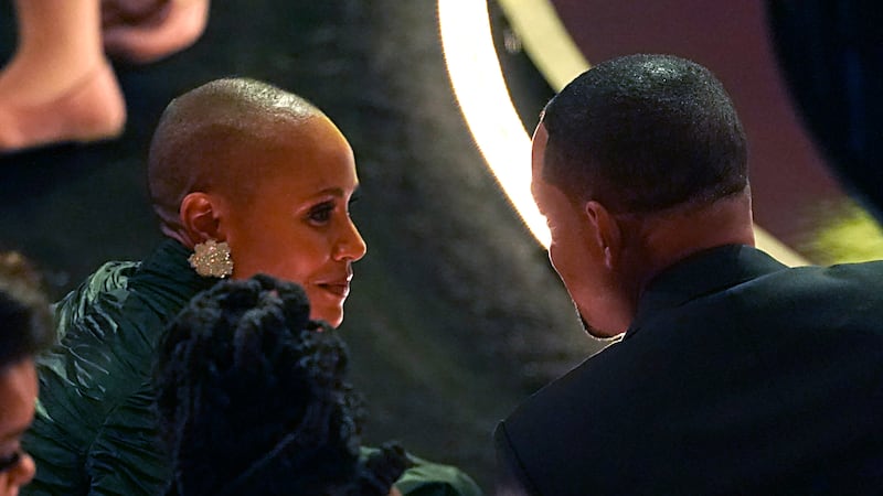 Jada Pinkett Smith, left, and Will Smith appear in the audience at the Oscars on Sunday, March...