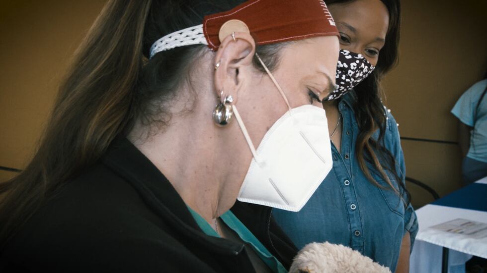 Dr. Katherine Patterson holds Jaquana Haley Williams' baby. Patterson helped her find a simple...
